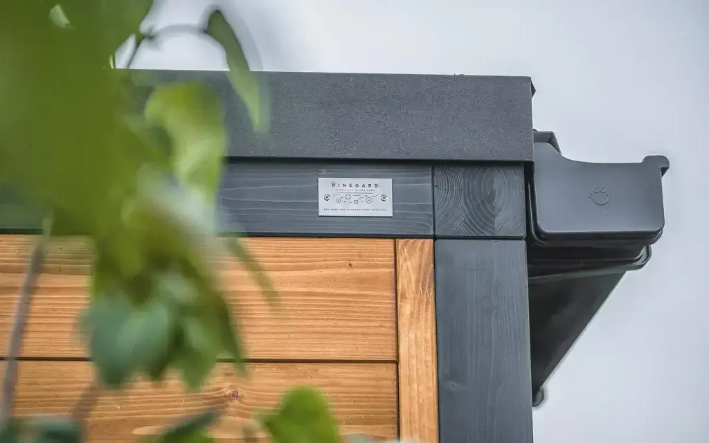 Detail of Pinegard timber cladding and a corner drainage system.